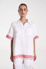 Sig Linen Shirt Neon Plaid by Summi Summi – a boxy shirt with plaid trim and relaxed fit. Perfect for everyday styling.