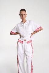Sig Linen Shirt Neon Plaid by Summi Summi – a boxy shirt with plaid trim and relaxed fit. Perfect for everyday styling.