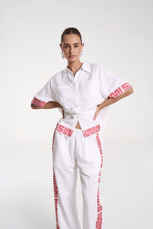 Sig Linen Shirt Neon Plaid by Summi Summi – a boxy shirt with plaid trim and relaxed fit. Perfect for everyday styling.