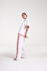 Sig Linen Shirt Neon Plaid by Summi Summi – a boxy shirt with plaid trim and relaxed fit. Perfect for everyday styling.