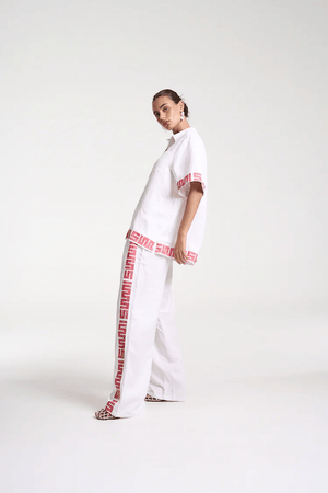 Sig Linen Shirt Neon Plaid by Summi Summi – a boxy shirt with plaid trim and relaxed fit. Perfect for everyday styling.