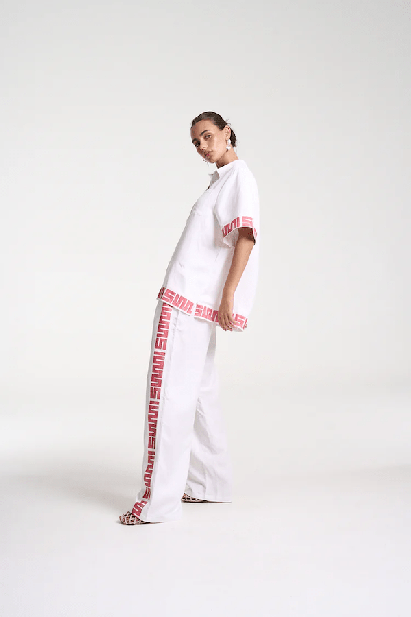 Sig Linen Shirt Neon Plaid by Summi Summi – a boxy shirt with plaid trim and relaxed fit. Perfect for everyday styling.