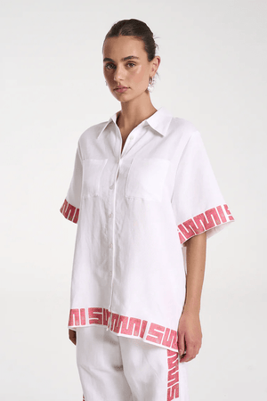 Sig Linen Shirt Neon Plaid by Summi Summi – a boxy shirt with plaid trim and relaxed fit. Perfect for everyday styling.