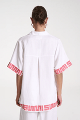 Sig Linen Shirt Neon Plaid by Summi Summi – a boxy shirt with plaid trim and relaxed fit. Perfect for everyday styling.