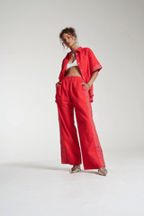 Sig Linen Shirt Scarlet by Summi Summi – a boxy shirt with embroidered trim and relaxed fit. Perfect for everyday styling.