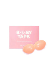 Silicone Booby Tape Inserts (A–C) by Booby Tape, soft waterproof silicone pair designed to lift and enhance cleavage. Reusable and lightweight.