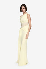 Sisal Mesh Dress by Misha, sheer lemon mesh with goddess-style draping and floor-length sash. Perfect for chic day-to-evening looks.