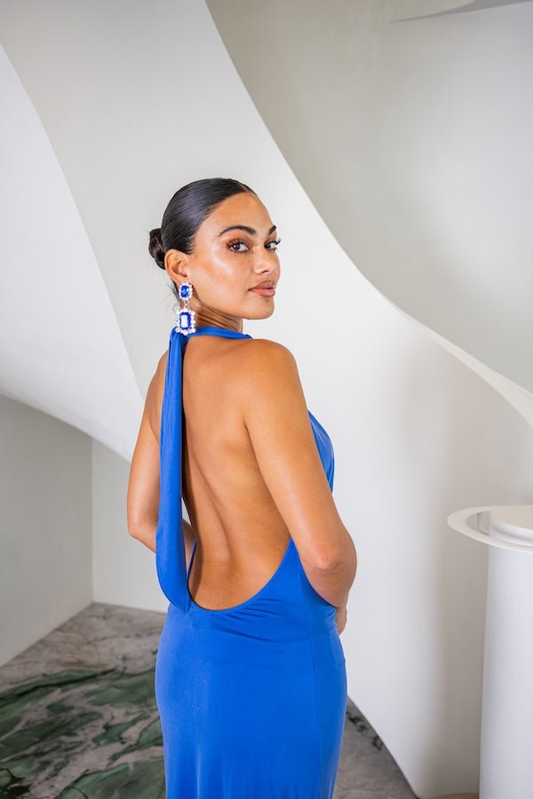 Saint Plunge Maxi Dress Sapphire by Sneaky Link – Trendy halter neck dress with a daring plunge, silky cupro fabric, perfect for elegant evenings and standout events.