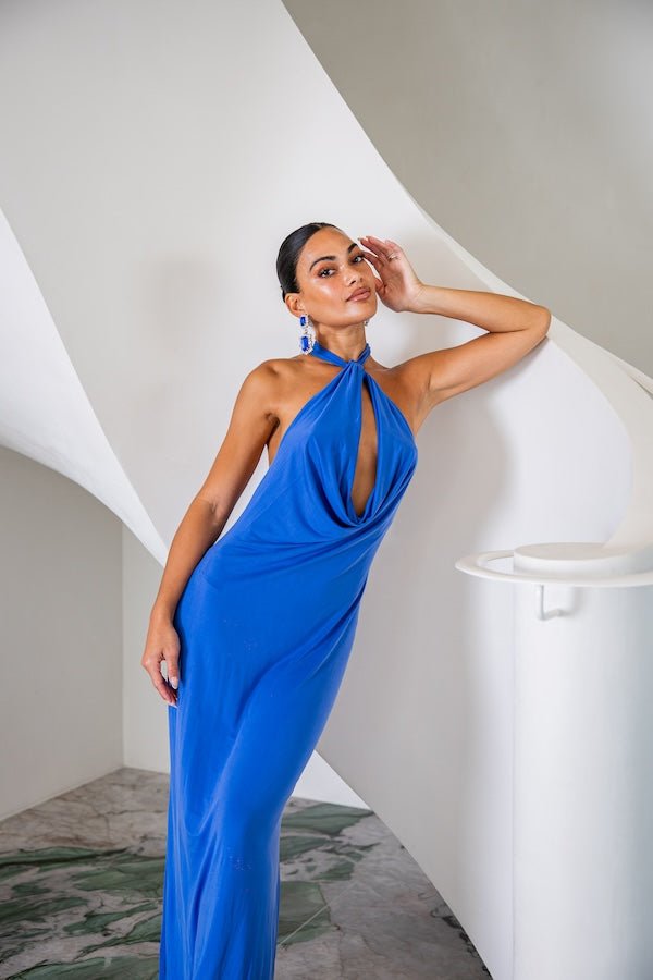 Saint Plunge Maxi Dress Sapphire by Sneaky Link – Trendy halter neck dress with a daring plunge, silky cupro fabric, perfect for elegant evenings and standout events.