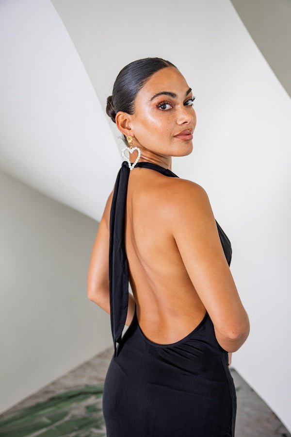 Saint Plunge Maxi Dress Black by Sneaky Link – A trendy halter neck maxi with a bold plunging neckline, silky cupro fabric, perfect for elegant nights and viral occasions.