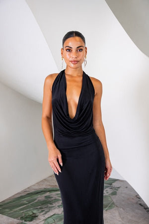 Saint Plunge Maxi Dress Black by Sneaky Link – A trendy halter neck maxi with a bold plunging neckline, silky cupro fabric, perfect for elegant nights and viral occasions.