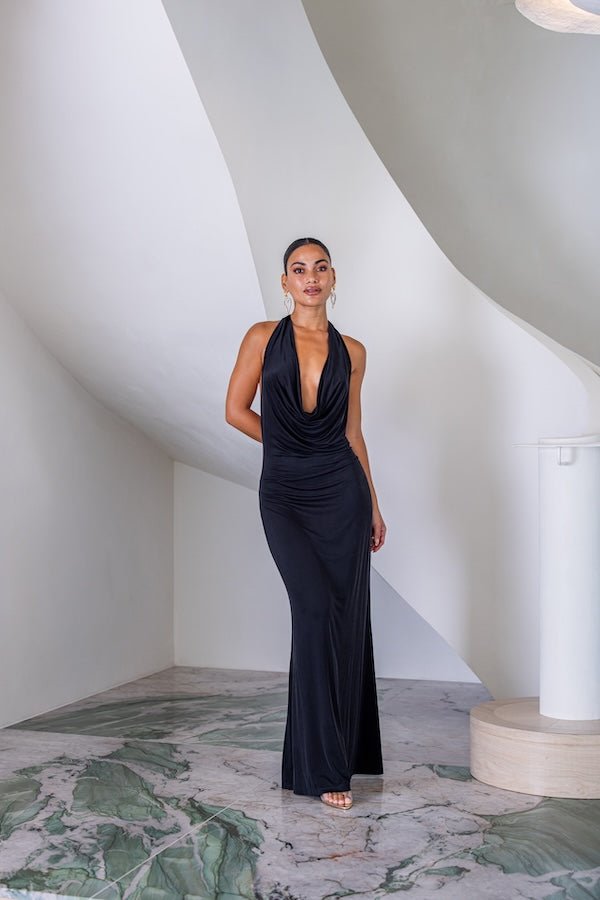 Saint Plunge Maxi Dress Black by Sneaky Link – A trendy halter neck maxi with a bold plunging neckline, silky cupro fabric, perfect for elegant nights and viral occasions.