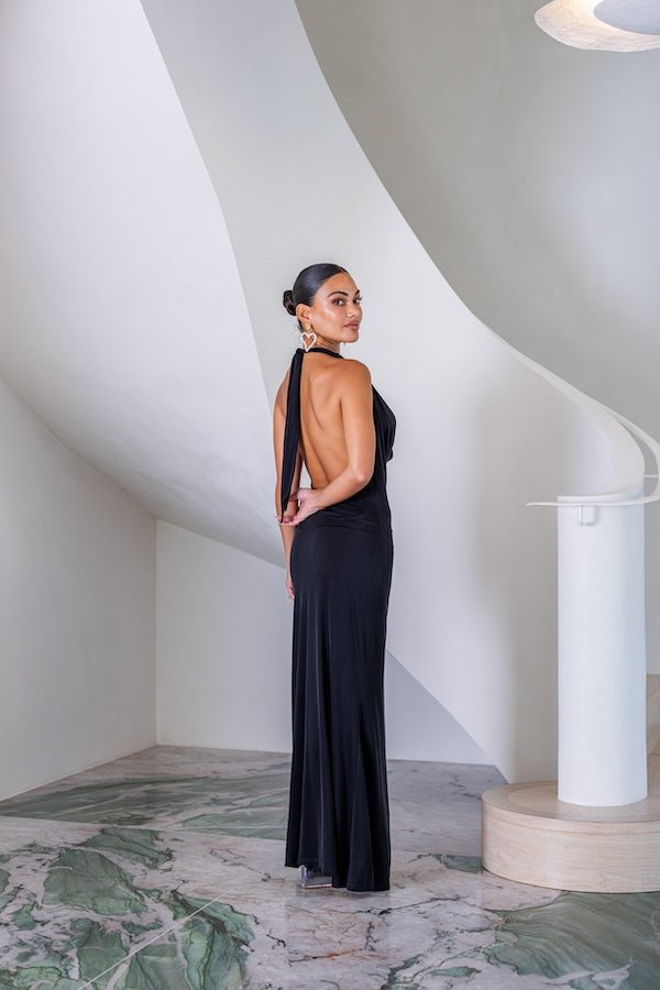 Saint Plunge Maxi Dress Black by Sneaky Link – A trendy halter neck maxi with a bold plunging neckline, silky cupro fabric, perfect for elegant nights and viral occasions.