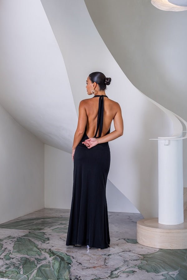 Saint Plunge Maxi Dress Black by Sneaky Link – A trendy halter neck maxi with a bold plunging neckline, silky cupro fabric, perfect for elegant nights and viral occasions.
