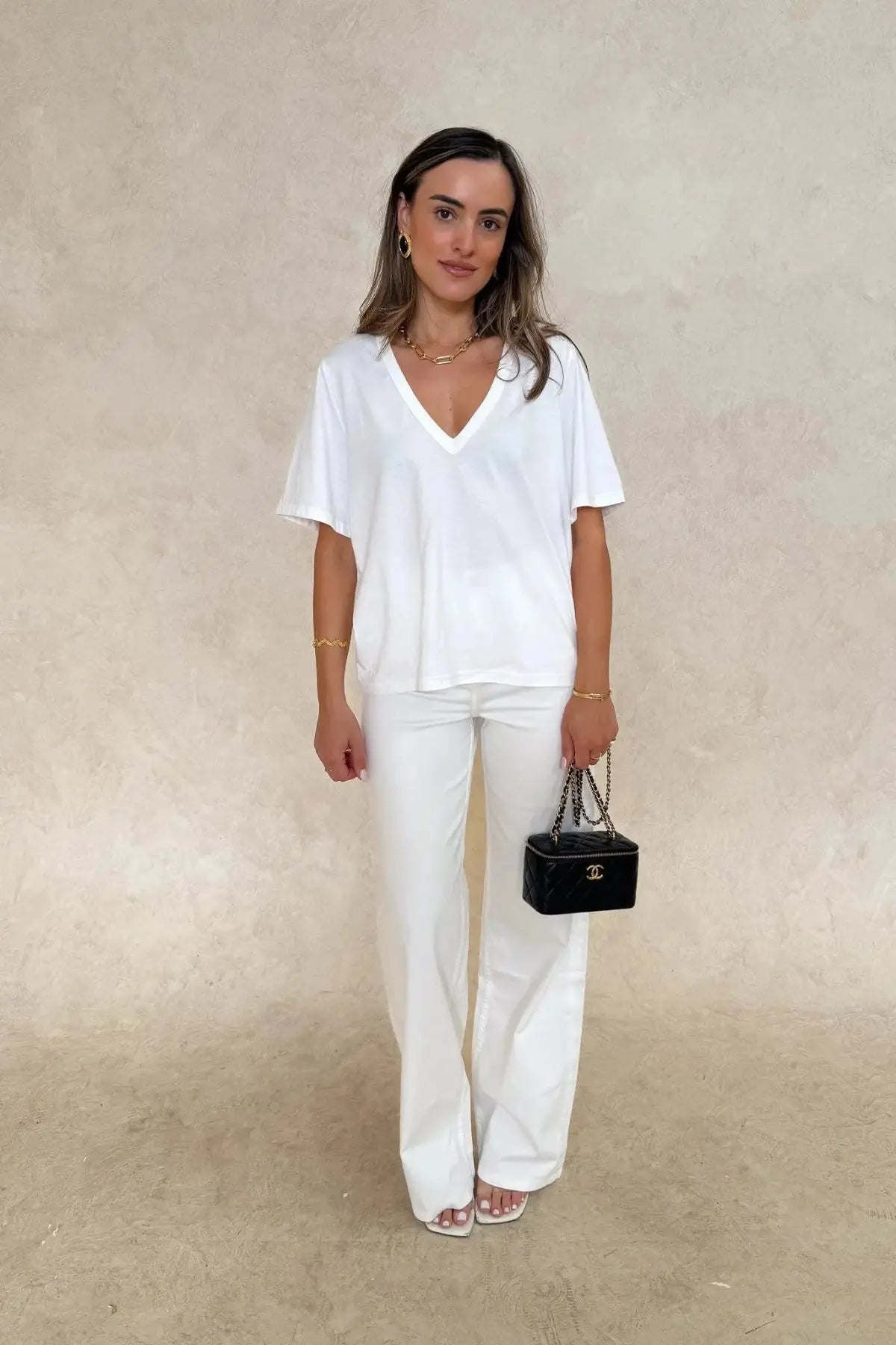 Sneaky Link Carter V Neck Tee White, a relaxed boxy cotton tee with short sleeves and flattering V neckline, perfect for effortless everyday wear.