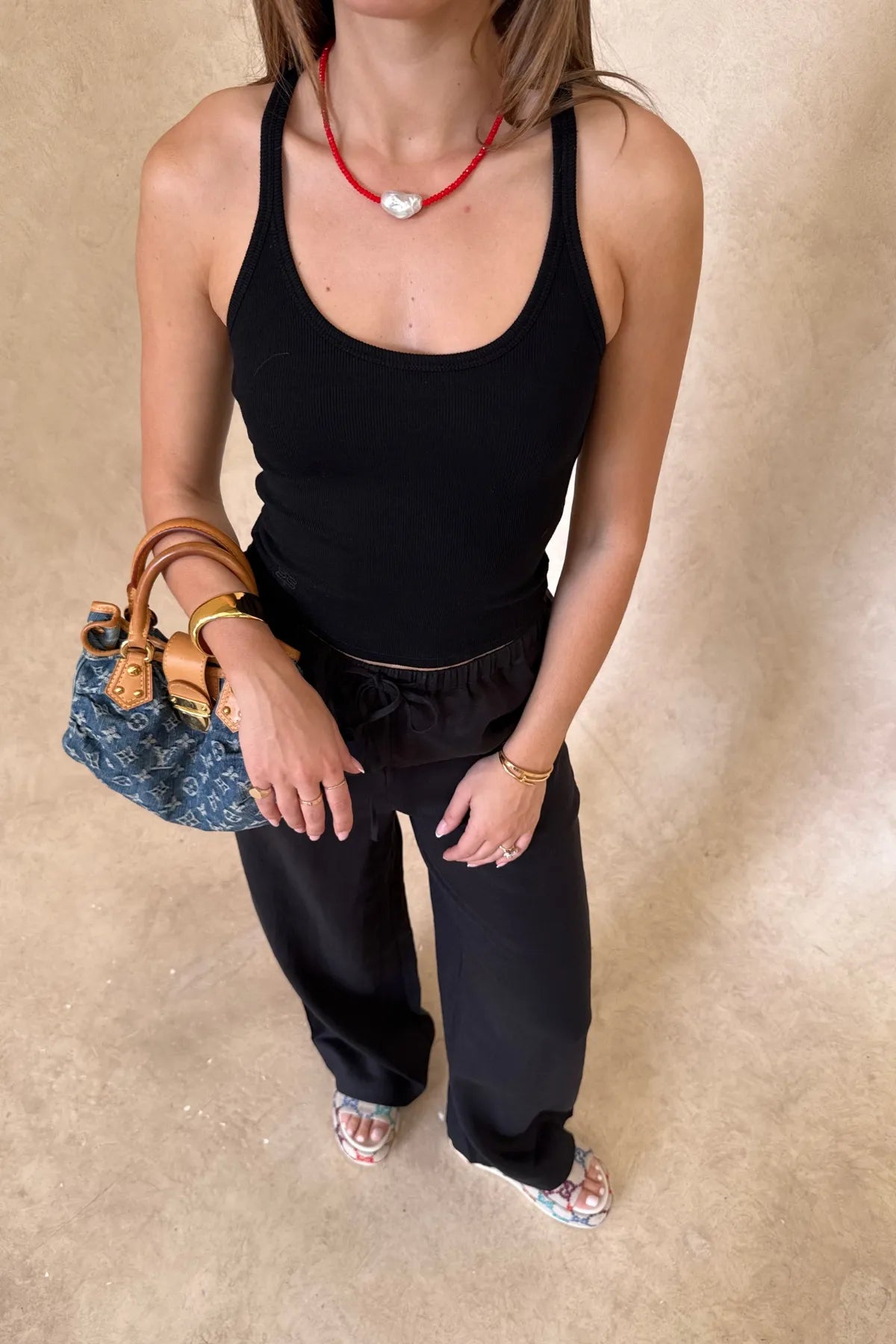 Sneaky Link Chiara Tank Black, a slim-fit cotton blend tank with scoop neckline and stretch finish, perfect for versatile day-to-night styling.