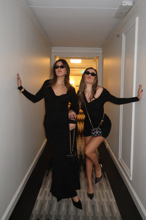 Hunter Long Sleeve Maxi Dress Black by Sneaky Link, sleek spandex blend with cowl neckline and draped waist for bold evenings.