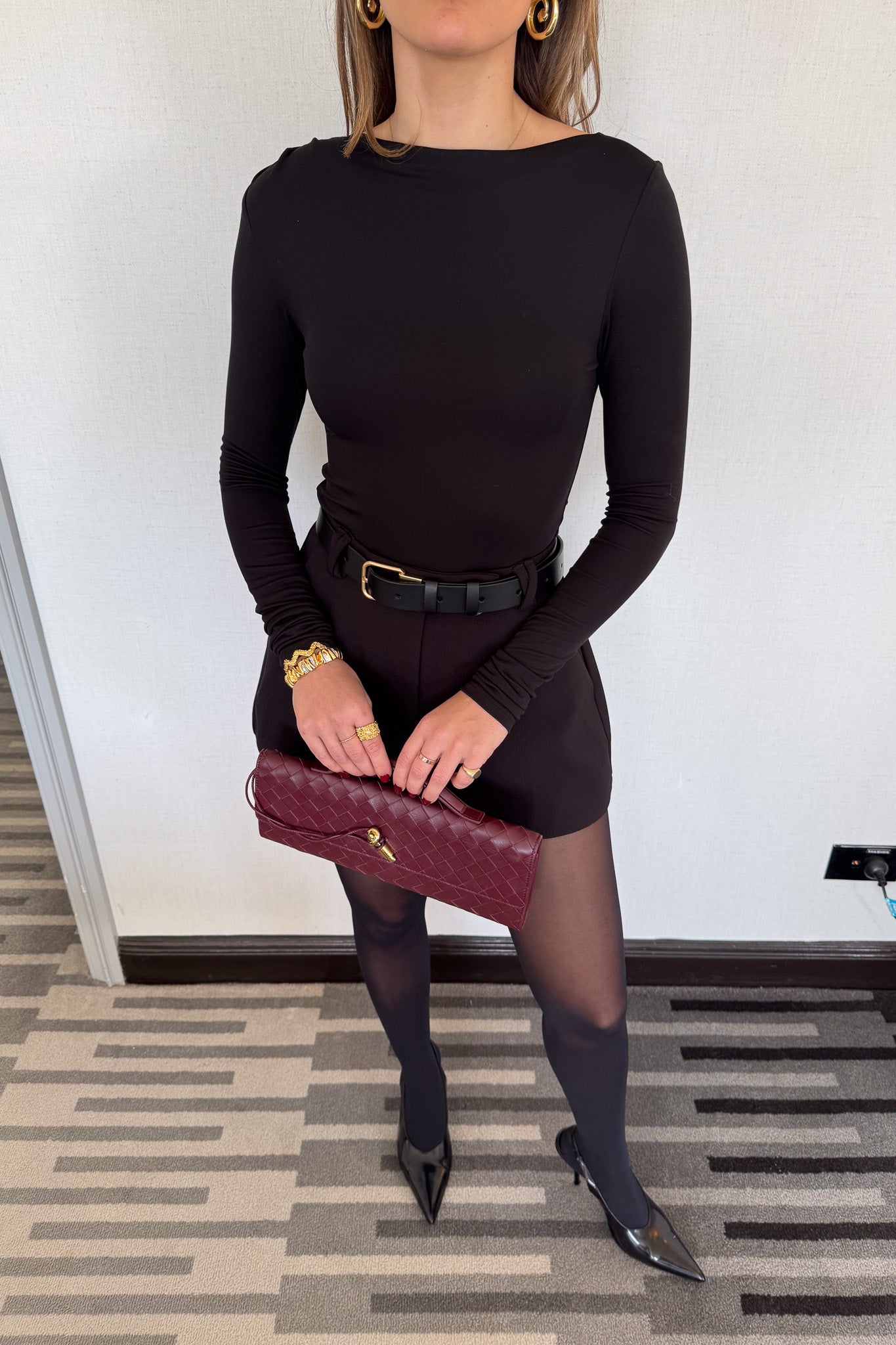 Meg Long Sleeve Top Black by Sneaky Link, made from soft modal-spandex, with boat neckline and delicate tucks, versatile for layering with any outfit.