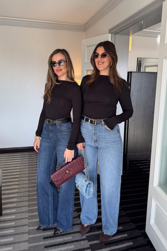 Meg Long Sleeve Top Black by Sneaky Link, made from soft modal-spandex, with boat neckline and delicate tucks, versatile for layering with any outfit.