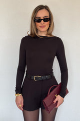 Meg Long Sleeve Top Black by Sneaky Link, made from soft modal-spandex, with boat neckline and delicate tucks, versatile for layering with any outfit.