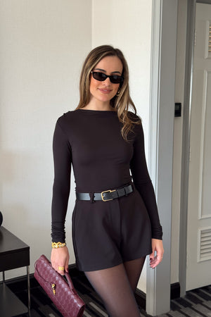 Meg Long Sleeve Top Black by Sneaky Link, made from soft modal-spandex, with boat neckline and delicate tucks, versatile for layering with any outfit.