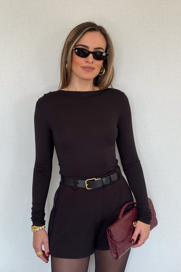 Meg Long Sleeve Top Black by Sneaky Link, made from soft modal-spandex, with boat neckline and delicate tucks, versatile for layering with any outfit.