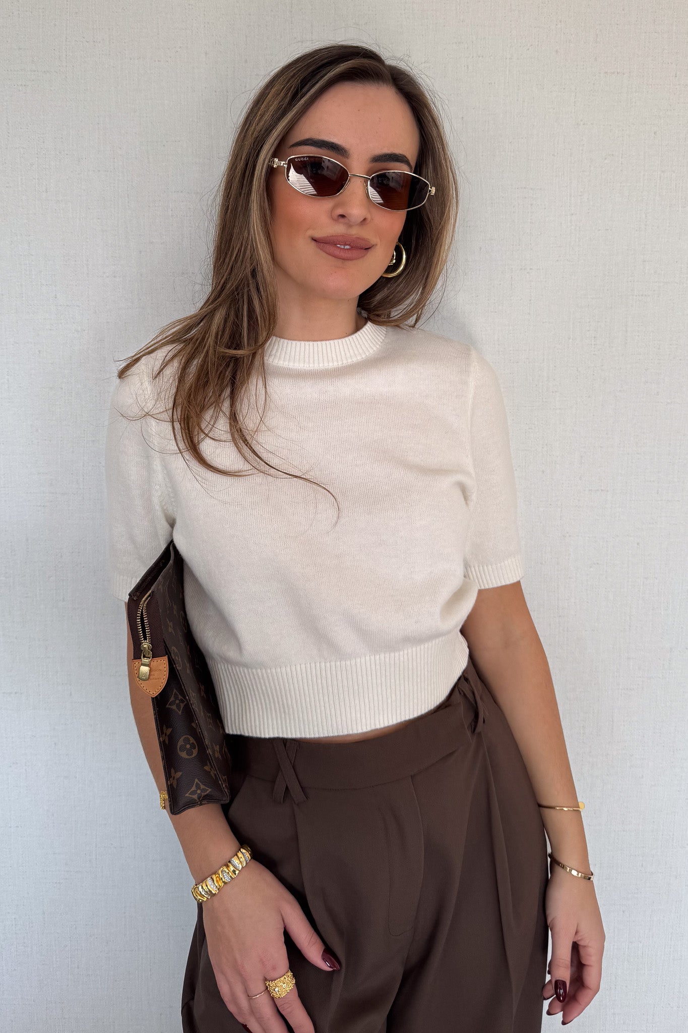 Niamh Knit Top White by Sneaky Link, a cropped knit tee with relaxed short sleeves, ribbed finishes, and a high scoop neckline — versatile for office styling or casual chic looks.