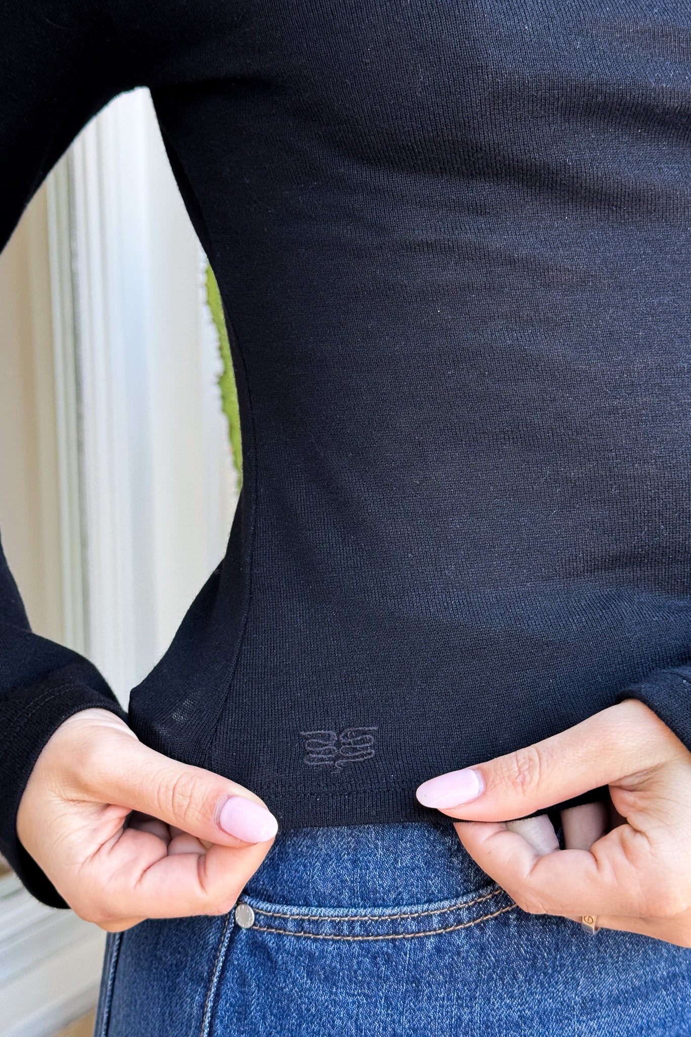 Tina Long Sleeve Top Black by Sneaky Link, cozy funnel neck top with long sleeves, perfect for layering or casual chic.