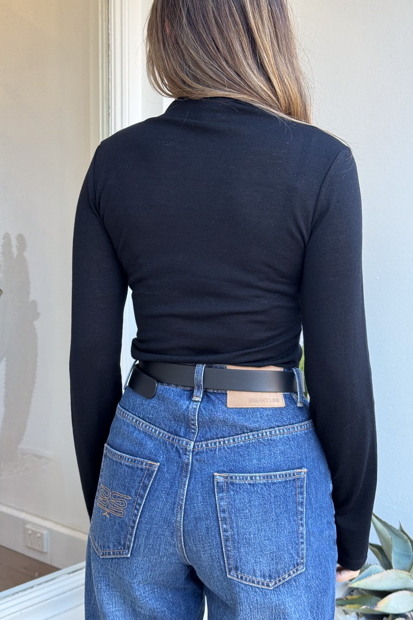 Tina Long Sleeve Top Black by Sneaky Link, cozy funnel neck top with long sleeves, perfect for layering or casual chic.