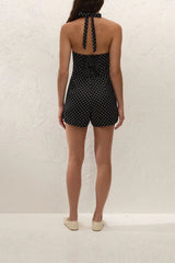 Sofia Playsuit Lola Polka Dot Black Cream by Faithfull the Brand – a halter playsuit with polka dots. Perfect for summer styling.