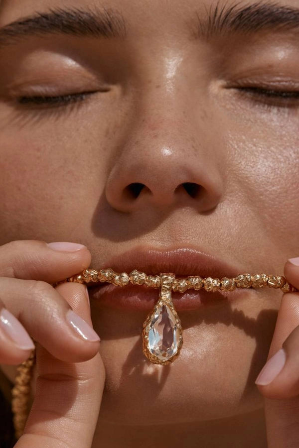 Sofian Necklace by Amber Sceats - gold necklace with clear quartz pendant and crushed beads, designed for bold elevated styling.