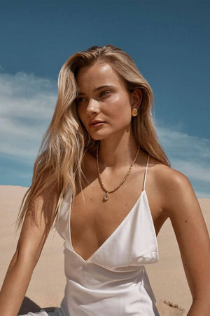 Sofian Necklace by Amber Sceats - gold necklace with clear quartz pendant and crushed beads, designed for bold elevated styling.