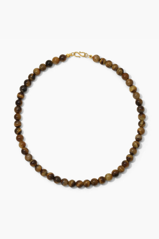 Sol Necklace Gold by Heaven Mayhem – polished gold beaded necklace with signature S clasp closure.