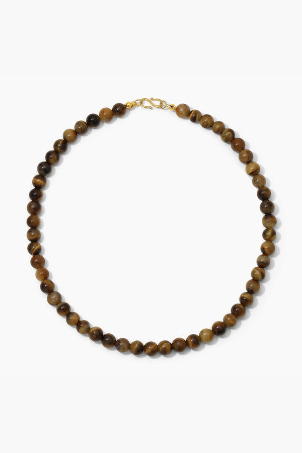 Sol Necklace Gold by Heaven Mayhem – polished gold beaded necklace with signature S clasp closure.