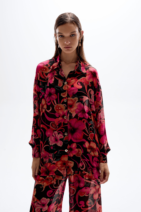 Solace Button Up Shirt Hibiscus Pink by Cin Cin Swim – a sheer shirt with floral print and gold buttons. Perfect for resort styling.