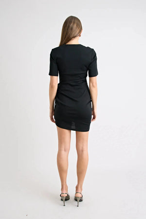 Solene Mini Dress Black by Pfeiffer, jersey mini with side ruching and adjustable ties, a trendy piece perfect for daytime styling or chic nights out.