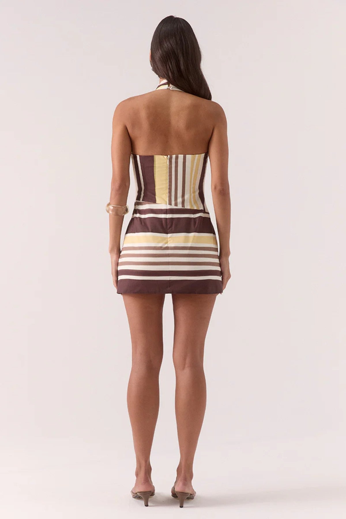 Sonali Skortsuit Banoffee by Sovere, a halter crossover design with wrap skirt and asymmetric waist in an exclusive printed cotton blend.