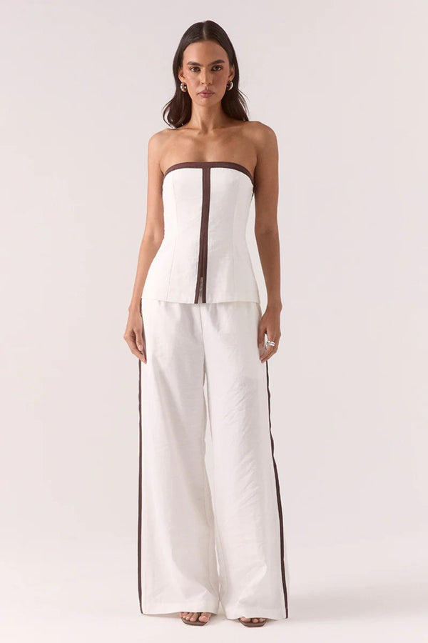 Sora Bodice Vanilla by Sovere, a strapless fitted top with contrast panels and front split for sleek day-to-night dressing.