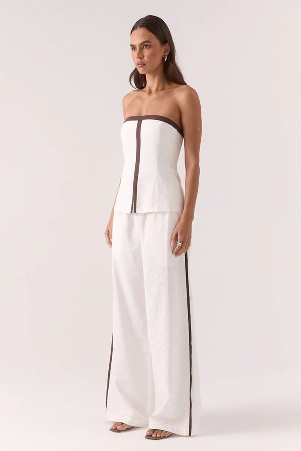 Sora Bodice Vanilla by Sovere, a strapless fitted top with contrast panels and front split for sleek day-to-night dressing.