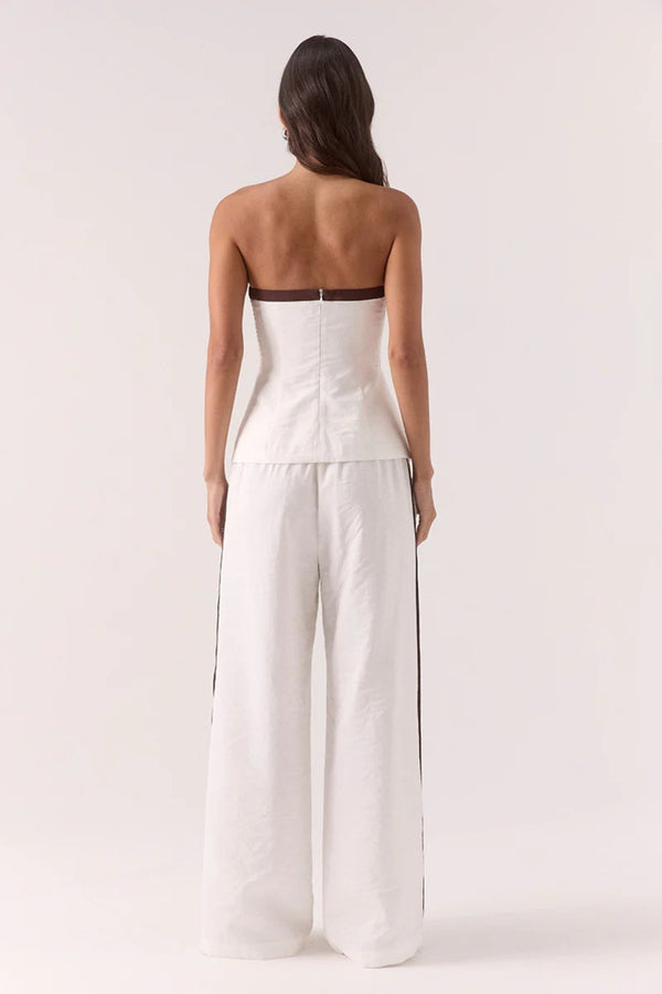 Sora Bodice Vanilla by Sovere, a strapless fitted top with contrast panels and front split for sleek day-to-night dressing.