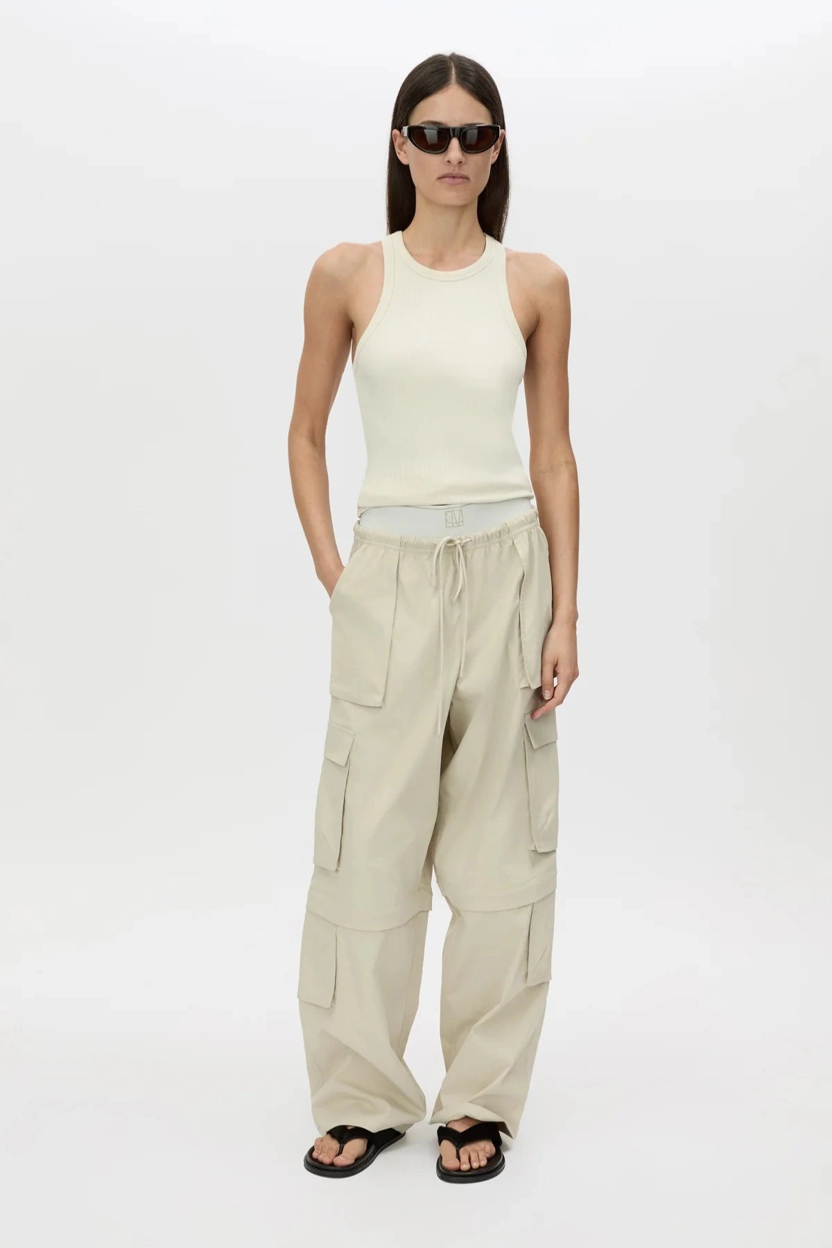 Soraya Cargo Pant Stone by Camilla and Marc, wide-leg recycled polyester cargo with 3D pockets and detachable detail, a trendy modern piece perfect for streetwear styling.