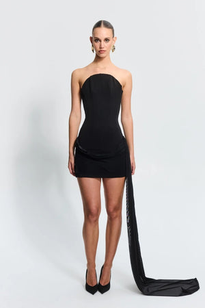 Soraya Mini Black by Effie Kats, a sculptural corset mini with mesh hips and boning detail. Perfect for art events or late summer nights.