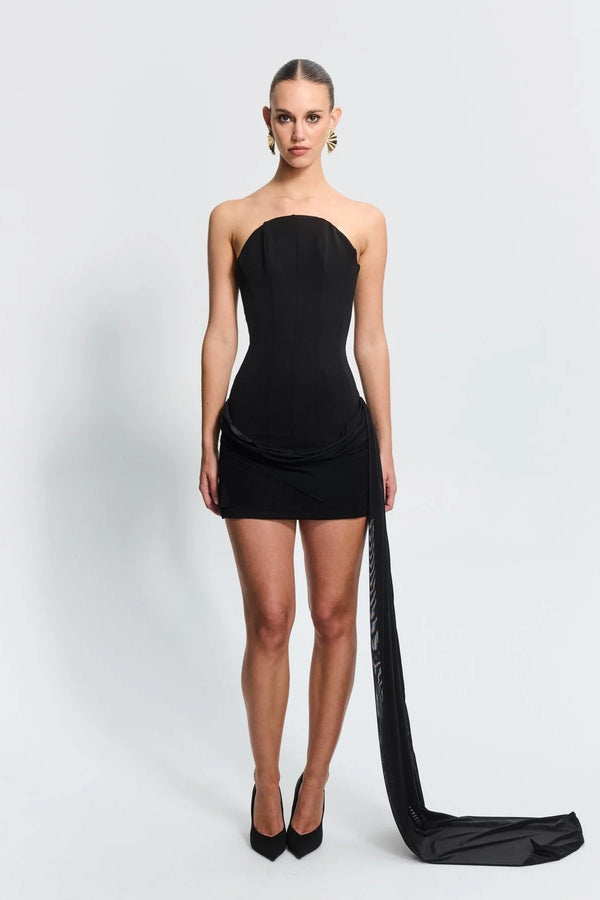 Soraya Mini Black by Effie Kats, a sculptural corset mini with mesh hips and boning detail. Perfect for art events or late summer nights.