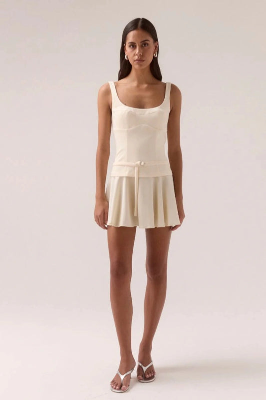 Sovere Demi Mini Dress in Lemonade, a sleeveless mini with scooped neckline, belted waist, and softly gathered skirt for chic summer style.