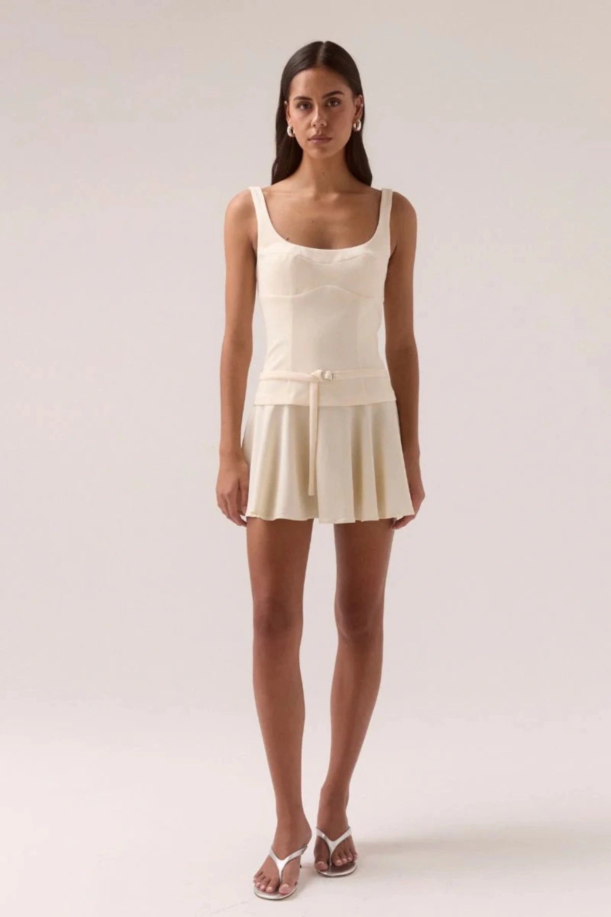 Sovere Demi Mini Dress in Lemonade, a sleeveless mini with scooped neckline, belted waist, and softly gathered skirt for chic summer style.