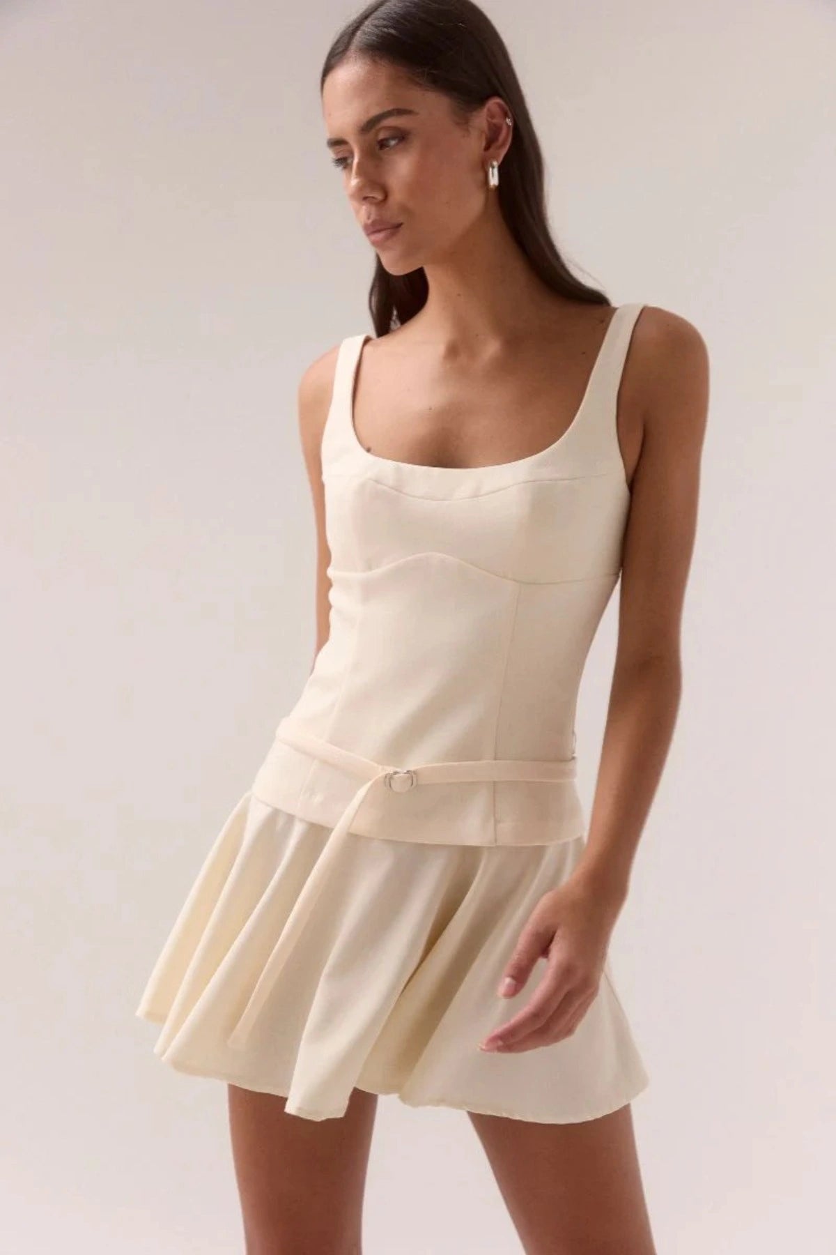 Sovere Demi Mini Dress in Lemonade, a sleeveless mini with scooped neckline, belted waist, and softly gathered skirt for chic summer style.