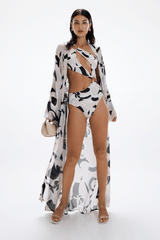 Spectacle Swimsuit Nautilus by Cin Cin Swim, cutout swimsuit with gold hardware detail. Perfect for beach days or statement swim looks.