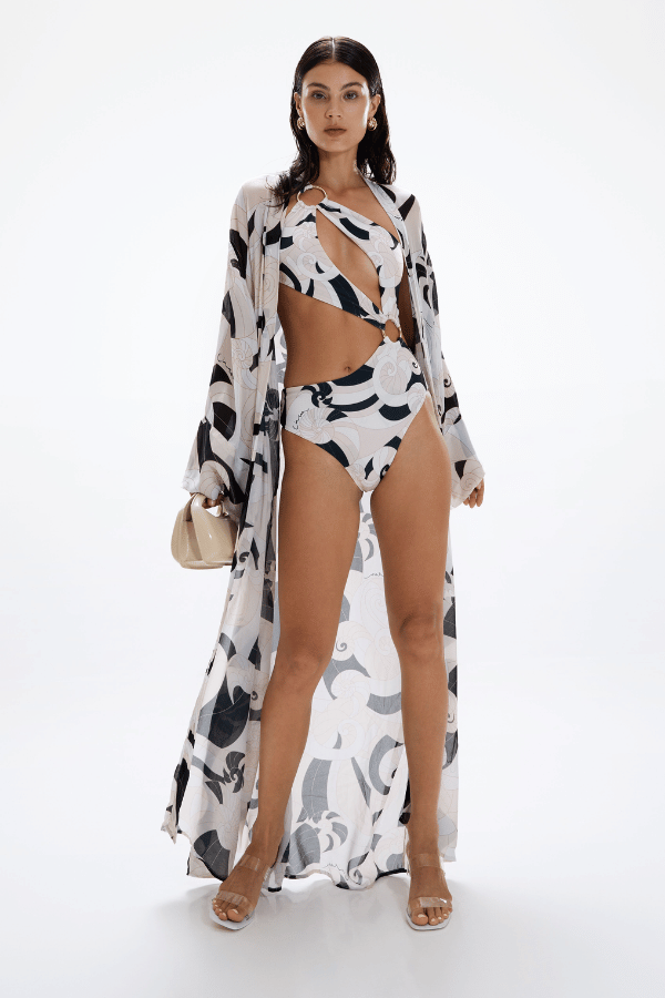 Spectacle Swimsuit Nautilus by Cin Cin Swim, cutout swimsuit with gold hardware detail. Perfect for beach days or statement swim looks.