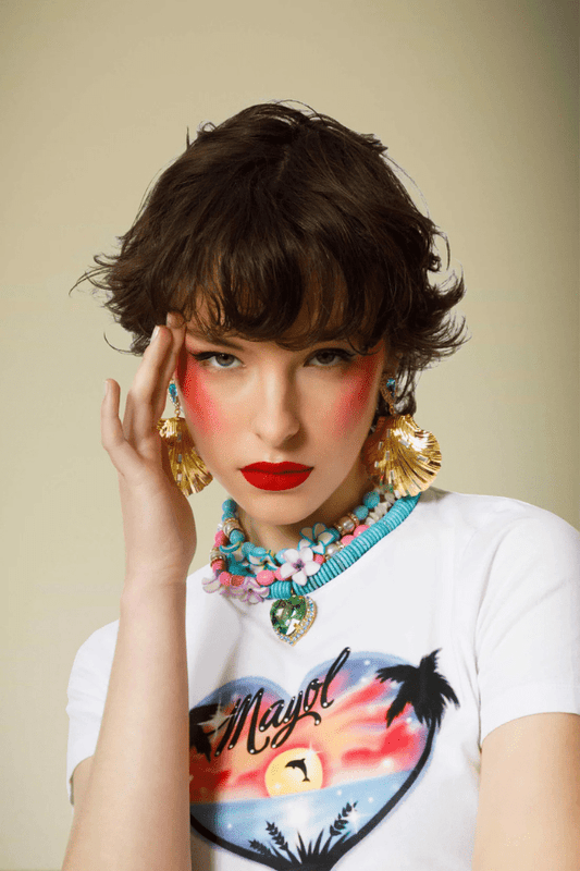 Splash Earrings by Mayol – gold plated earrings with crystal detail and long drop design. Perfect for statement styling.