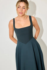 Square Neck Midi Dress by Odd Muse, bold teal midi with structured neckline and tailored fit. Ideal for elegant party season looks.